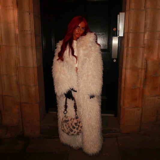Shaggy cream faux fur coat