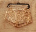“Scale” shorts in cream